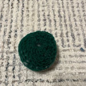 Green crochet sphere